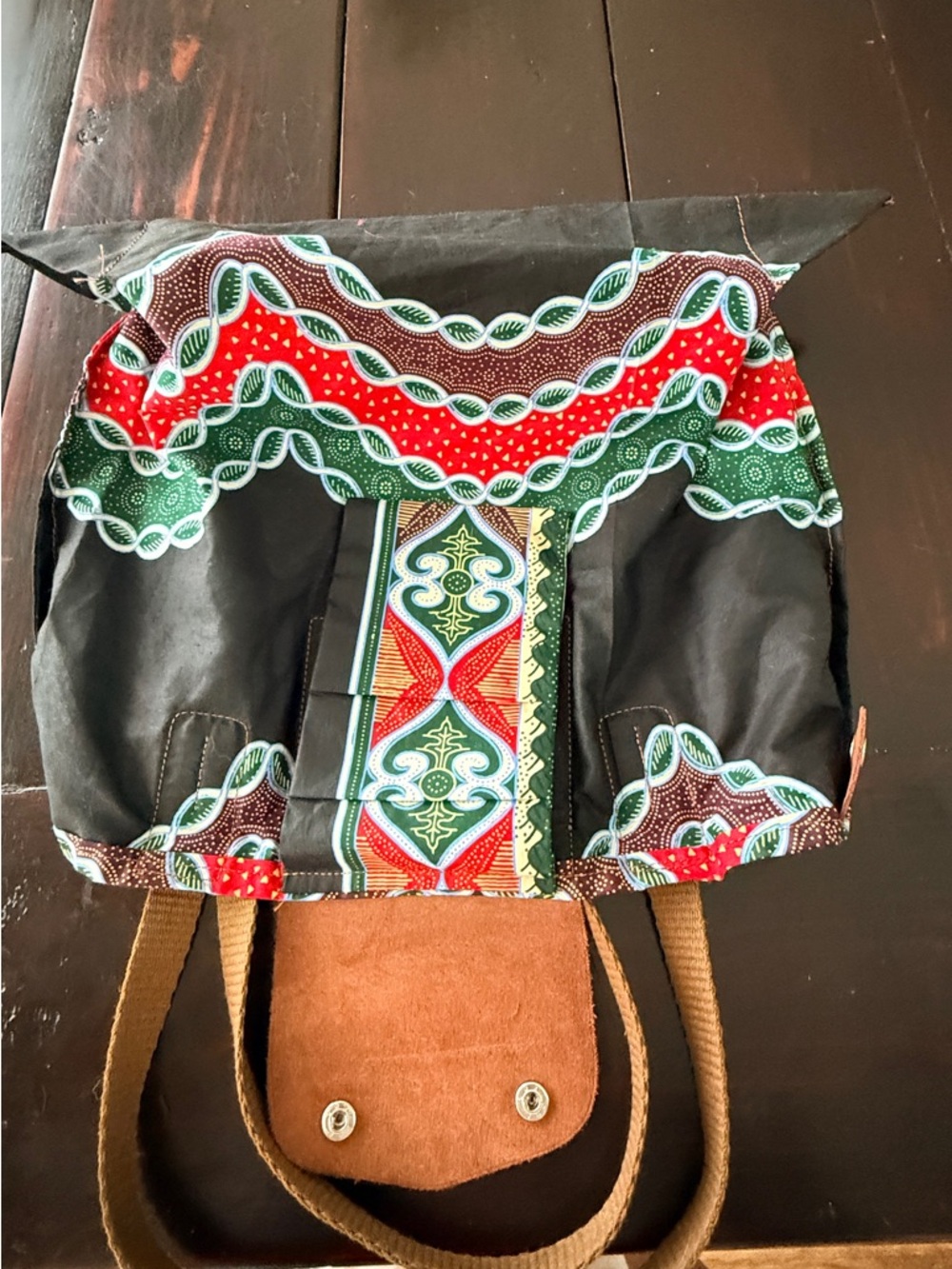 Lulea NWOT Made in Kenya
Leather Globally inspired
Foldable Tote boho/hobo vibes - Picture 4 of 8